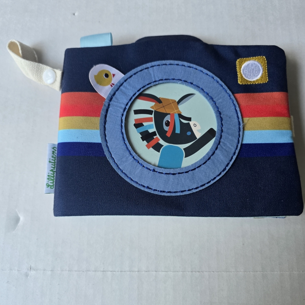 Ignace Baby Photo Album featuring a Camera